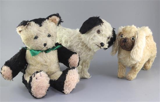 Two dogs English 1930s, one large cat 1950s, tallest 15in.